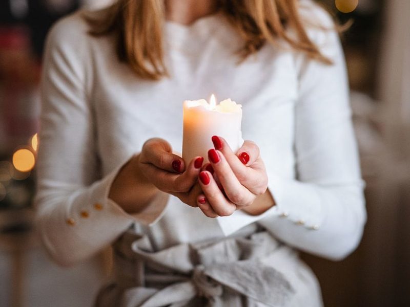 Internet Burns Woman Caught in Candle MLM Scheme