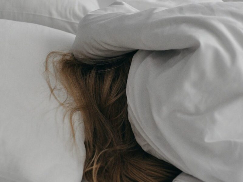 Why Your Brain and Stomach Want You to Sleep on Your Left Side