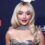 Sabrina Carpenter Wears Extremely Short Shorts And Fails To Hitchhike In A New Teaser Video